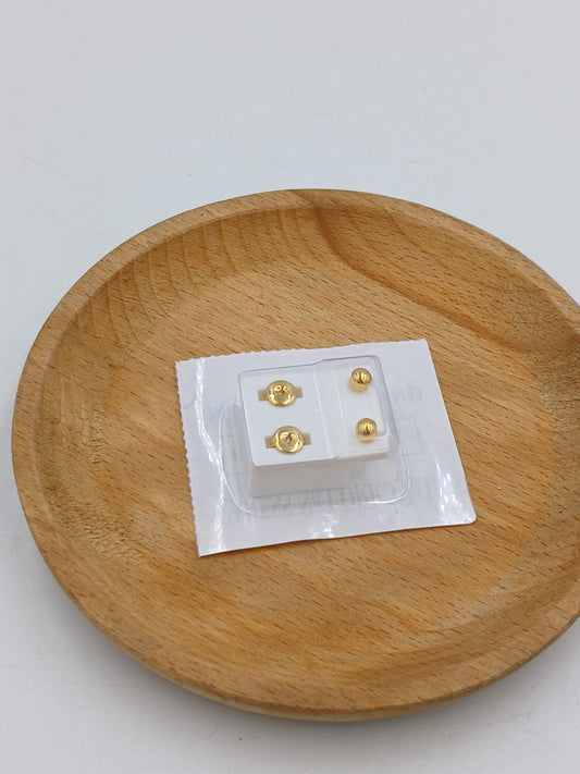Gold stud earrings