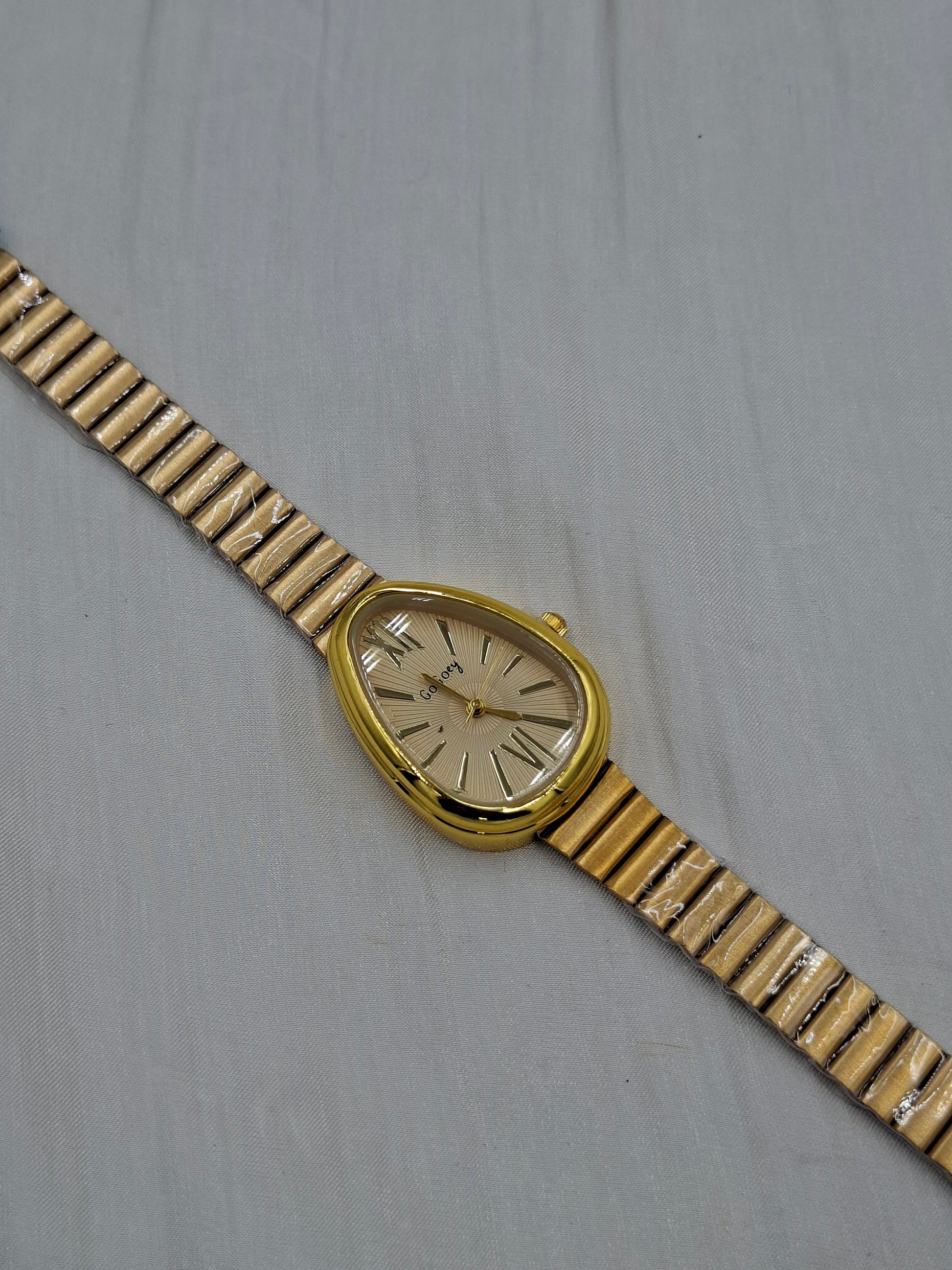 Shop Gold Pear-Shaped Wristwatch at Elsa Lagos in Nigeria