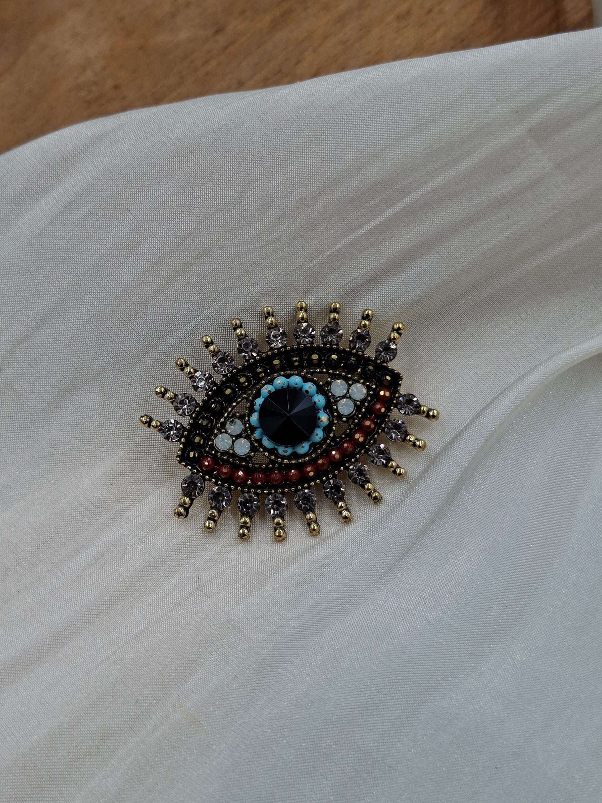 Buy Multicolour Eye Brooch for Women at Elsa Lagos in Nigeria