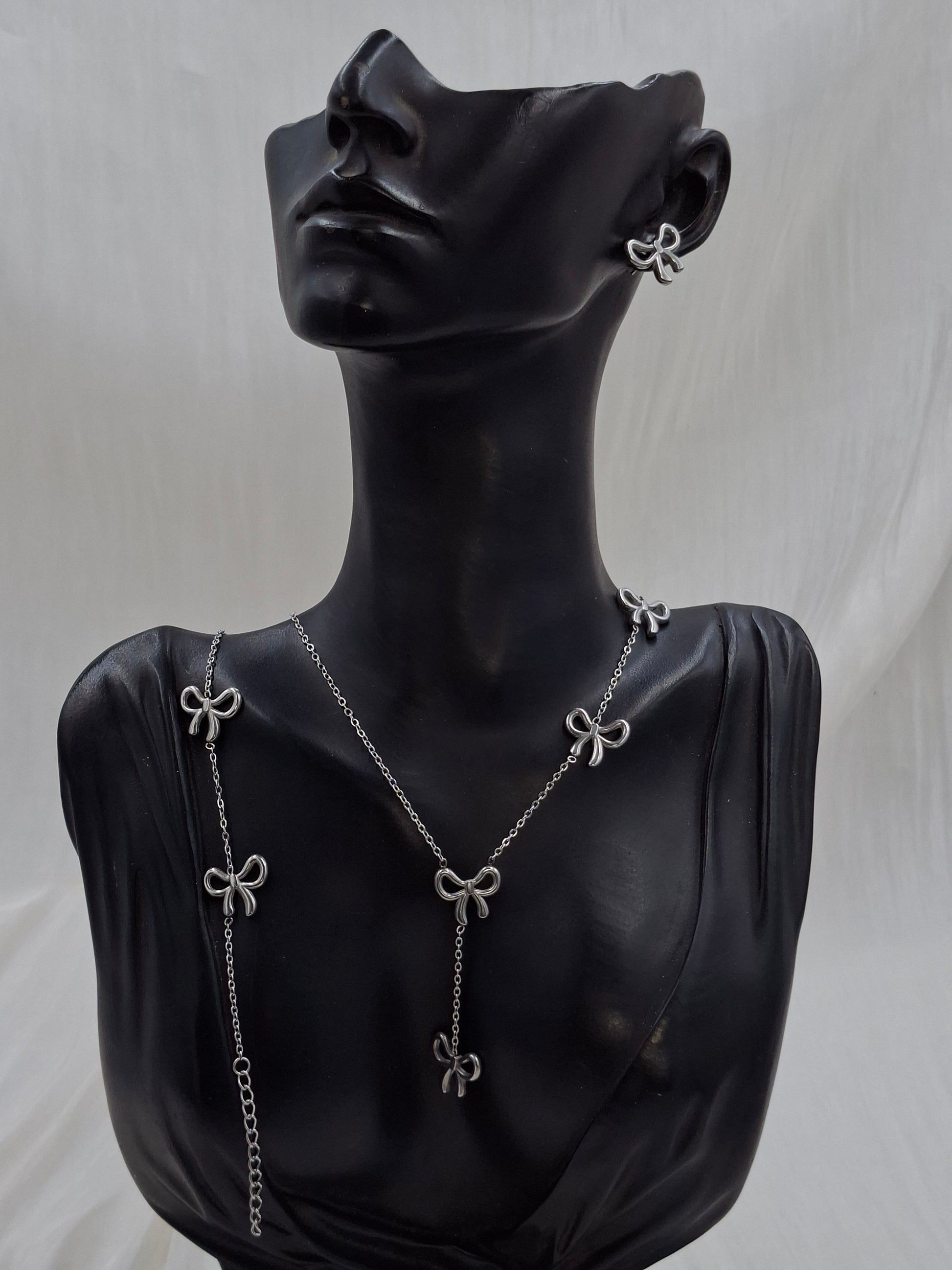 Buy Buy Silver Bow Necklace Set at Elsa Lagos in Nigeriay Set at Elsa Lagos in Nigeria