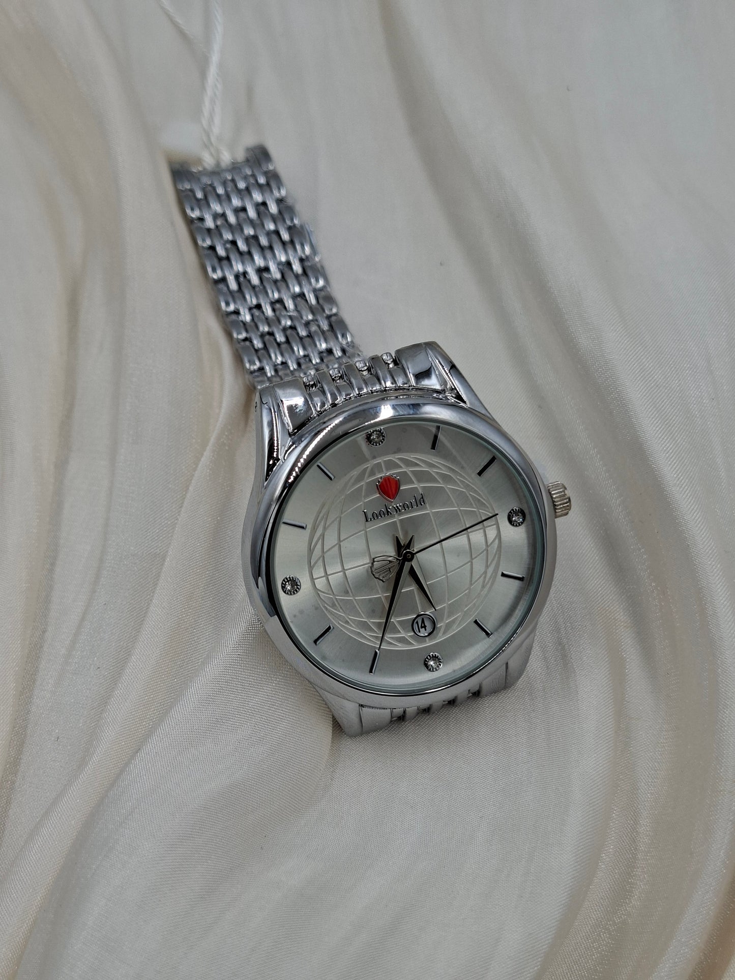 Buy Silver round Wristwatch for Women at Elsa Lagos. 