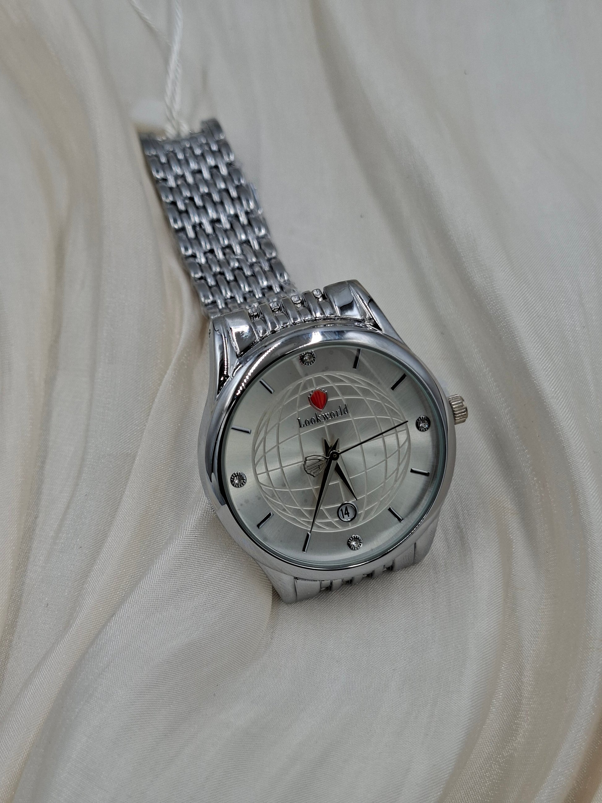Buy Silver round Wristwatch for Women at Elsa Lagos. 