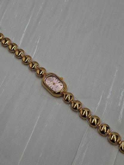 Oval Gold and Pink Wristwatch
