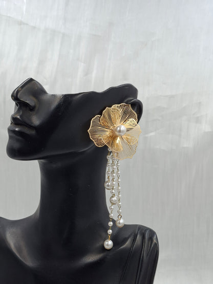 Gold Dangling Pearl Earrings