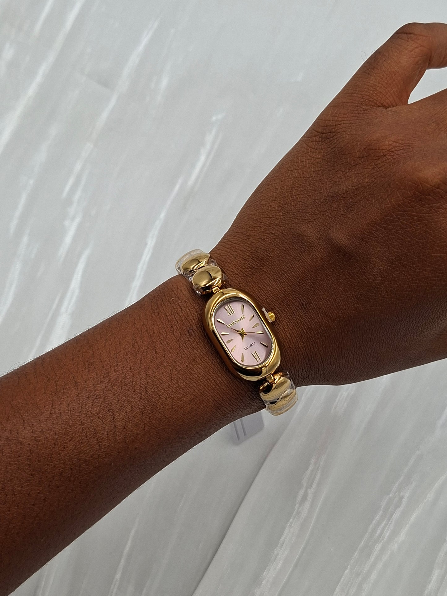 Oval Gold and Pink Wristwatch
