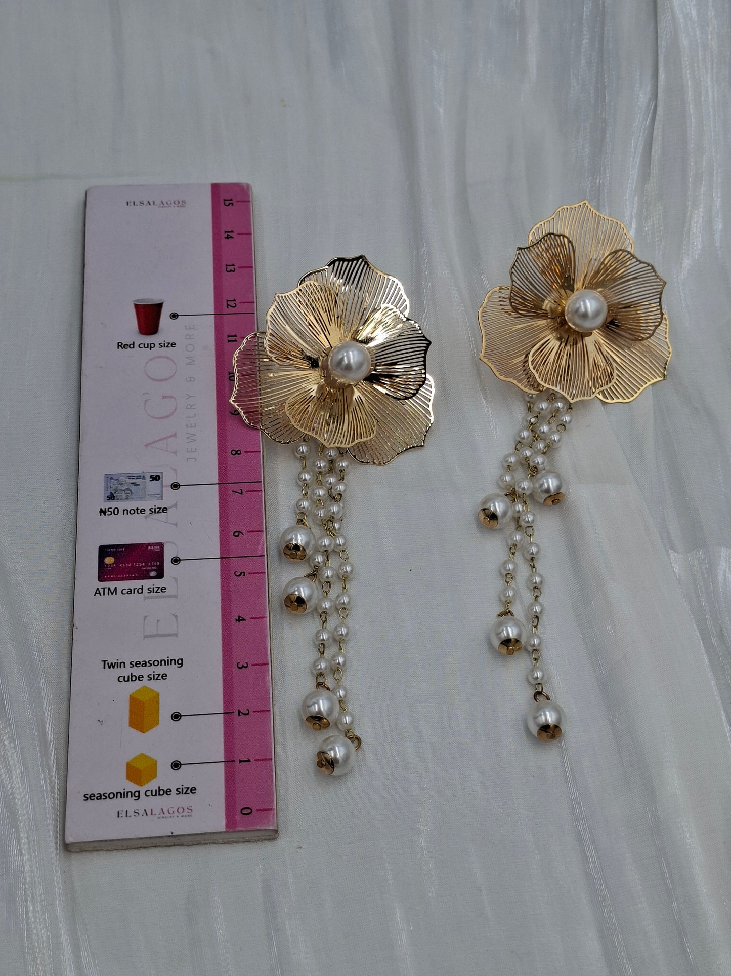Gold Dangling Pearl Earrings